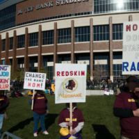 Native Americans protest the Washington Redskins professional football team.