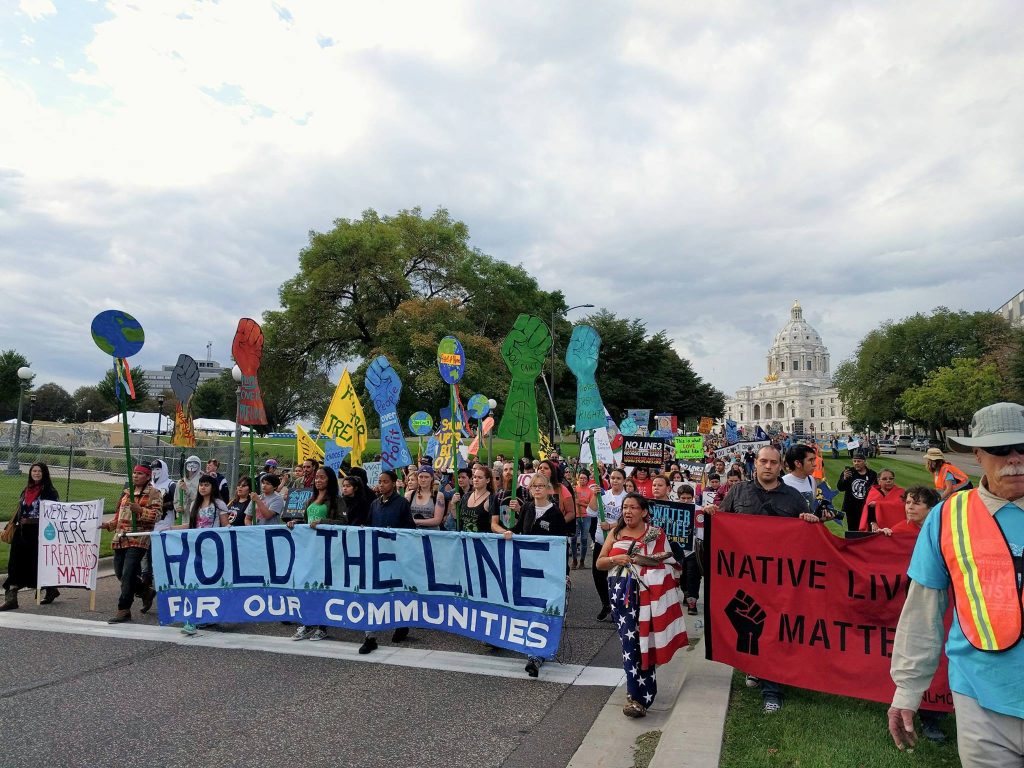 1,000 opponents of the Line 3 pipeline project gather in St. Paul to rally, march and testify against the proposed tar sands pipeline. MN350, a Piper Fund grantee, engaged their community in 2018 to defend the rights of pipeline protesters. Photo by Andy Pearson, MN350.org.