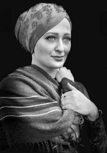 Stylized Headshot of Basma Alawee, a former refugee from Iraq, is the National Campaign Director for We Are All America,
