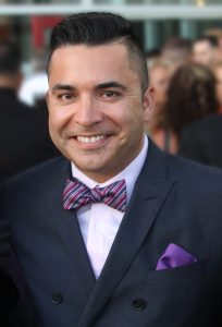 Headshot of newly hired NCRP Vice President and Chief External Affairs Officer Russell Roybal (he/they). 